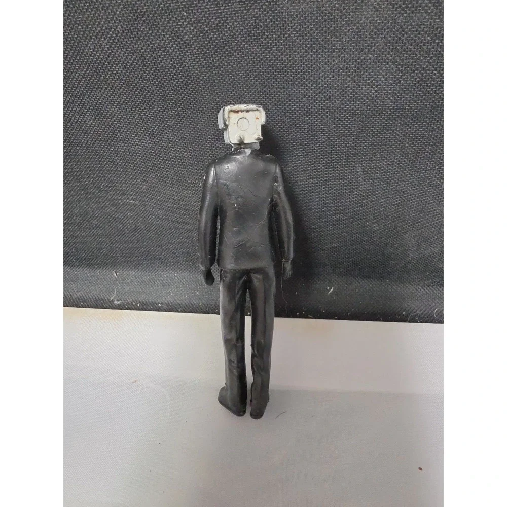 Skibidi Toilet TV Man Figure White Head Black Suit Blue Shirt